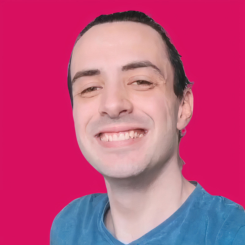 A smiling guy looking at you on a bright punchy background